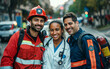 © FreyStudios - A police officer, a paramedic, and a doctor are posing for a picture, concept of city heroes, helping occupations, doctor, firefighter