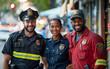 © FreyStudios - Police officers and firefighters pose together for a picture, concept of city heroes, helping occupations, doctor, firefighter