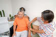 © Gatot - Happy Asian Father Given Massage By His Two Son At Home