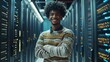 © Mark - IT engineer with a bearded head and crossed arms posing in middle of a rack of server computers in a data center server room.