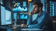 © Sandu - Young Finance Professional Analyzing Data on Multiple Screens