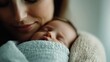 © svastix - A close-up photograph of a newborn baby sleeping peacefully, swaddled in a soft blanket, showcasing a sense of warmth, love, and the tranquility of infancy.