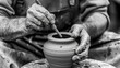 © Auon - Black white image of a modern potter using advanced handbuilding tools and techniques to craft a unique piece of pottery
