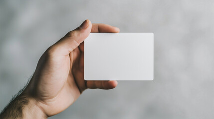 hand holding an empty white business card, set against a transparent background. This mockup is ideal for corporate business advertising and branding presentations, offering flexib