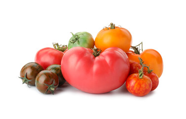 Different sorts of fresh ripe tomatoes isolated on white