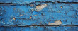 © AI_images - A blue textured surface with a rough, weathered texture, reminiscent of aged, chipped paint, giving a rustic look.