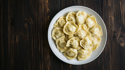 Wall Mural - Elegant display of homemade dumplings on a rustic wooden table tempts the taste buds