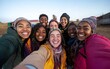 © Matthew - A joyful group of women posing for a selfie outdoors, showcasing friendship and happiness.