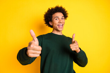 Sticker - Portrait of nice young man point fingers you wear sweater isolated on yellow color background