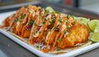 © talkative.studio - Crispy Fish Tacos with Red Cabbage, Cilantro, and Orange Sauce