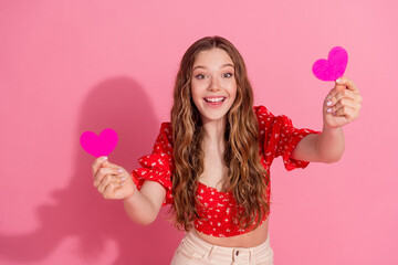 Sticker - Photo portrait of lovely teen lady excited hold heart postcards dressed stylish red garment isolated on pink color background