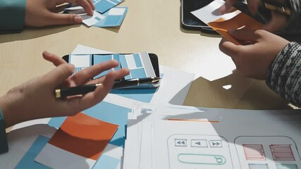 The designer team is designing the uxui system to make the uxui system work well on new phones and support system updates. Website development concept UI UX front end designer