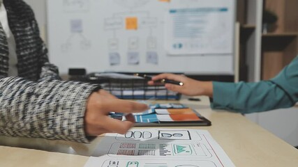 The designer team is designing the uxui system to make the uxui system work well on new phones and support system updates. Website development concept UI UX front end designer