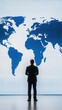 © Sakiyah - Leader standing in front of a large interactive map of global markets, giving a presentation on international business expansion strategies