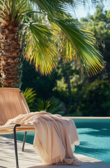 Wall Mural - Outdoor pool area with modern beach chair and soft towels, surrounded by tropical palms