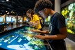 © Sanchai - History museum interactive display with digital timelines and maps, captured in a photo where visitors engage with a large digital screen displaying interactive maps and timelines, allowing