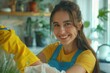 © Nognapas - Young Smiling Woman in Gloves Cleaning House. Closeup of Happy Beautiful Girl wearing Protective Gloves Cleaning Desk by spraying Cleaning Products and wiping with Sponge. Woman Cleaning Apartment