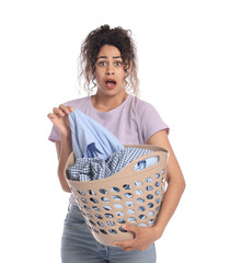 Poster - Emotional woman with basket full of laundry on white background