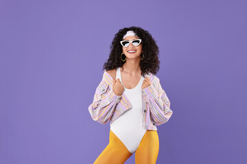 Poster - Aerobics. Happy woman in sunglasses on purple background