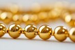 © AIGen - Gold Beads Accessory on White Canvas. Closeup of Celebratory Decoration