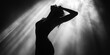 © Murda - Silhouette of a woman in light.