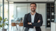 © forenna - photorealistic portrait of a smiling young businessman standing in a modern apartment interior, representing success in property investment and real estate agreements. Great for vi