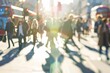© Svetlana - A vibrant crowd of pedestrians crossing a sunlit street in London, capturing the essence of urban life in motion