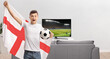 © Ljupco Smokovski - Excited english footballfan waving a flag in front of tv
