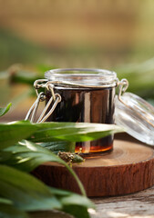 Sticker - Homemade ribwort plantain syrup for cough in a glass jar