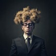 © Andrii - Businessman with wild hairstyle poses confidently against a dark backdrop