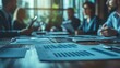 © Abdhul - Business Meeting Table with Documents in Focus