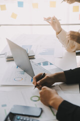 financial analysts analyze business financial reports on a digital tablet planning investment projec