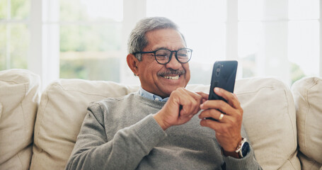 Home, senior man and smartphone with typing, internet and message for contact, texting and relax. Mature person, apartment and elderly guy with cellphone, digital app and mobile user with network