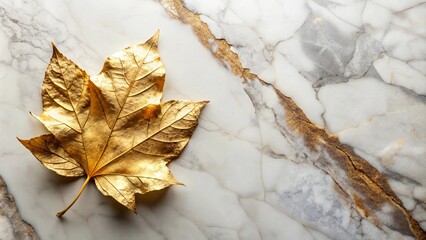 Wall Mural - Close up of a shimmering gold leaf on a luxurious marble background