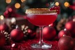 © Khawla - Christmas-themed cocktail with golden glitter lining the rim, traditional Christmas decorations and baubles create a cozy, celebratory atmosphere