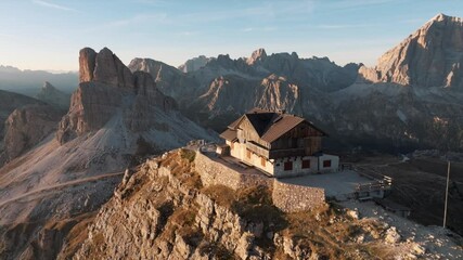 aerial view of mountain peaks during sunrise in the dolomites, italy