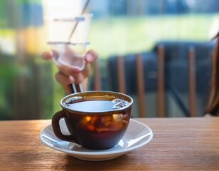 Wall Mural - cup of coffee on the table