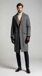 © Arceli - Man wearing wool overcoat and gloves on plan white background