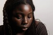 © Svetlana - A melancholic moment: A young Black teenager reflects on her struggles in a quiet, contemplative space