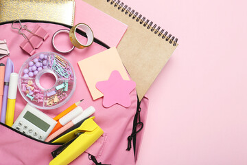 Sticker - Backpack and different school stationery on pink background, top view. Space for text