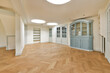 © ADDICTIVE STOCK - Empty elegant room with parquet floor and built-in cabinets