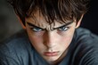 © AIGen - Angry Teenage Boy Gazing with Troubled Look - Caucasian Photogenic Teenage Boy Looking Head On