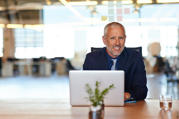 Sticker - Laptop, portrait and smile of mature manager at desk in office for administration or research. Computer, management and planning with happy man in corporate workplace for professional career