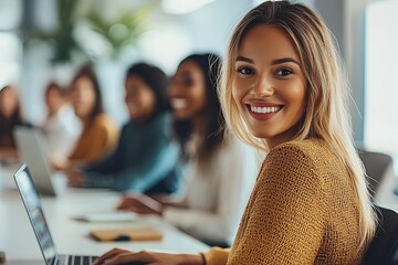 Wall Mural - Blonde woman in casual outfit, sitting at the desktop with colleagues discussing new project startup, looking at the camera, enjoying the process of working.