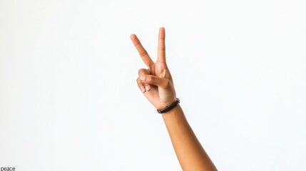 A woman's arm is shown against a white background, with her two fingers raised in a 