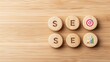 © Sweet.Duck - Wooden circular blocks with SEO text and icons symbolizing strategic online growth and targeted marketing success.