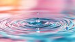 © familymedia - A visually captivating image of a water droplet creating ripples with vibrant multicolored reflections, symbolizing simplicity and tranquility in nature's beauty.