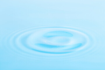 Water with circles radiating from the center