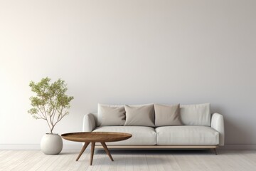 Wall Mural - A cozy living room arrangement with a grey sofa and white walls, showcasing a minimalist design and a potted plant for a touch of greenery in a modern home