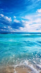 beach with blue sky and white clouds